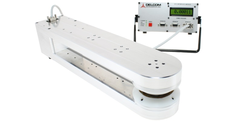 Vacuum-ready, non-contact, eddy current instrument for real time, inline, and in situ measurement of the sheet conductance or Ohms/sq of moving web of conductive thin films.