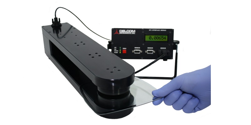 Non-contact eddy current instrument for measuring the sheet conductance or Ohms/sq of conductively coated glass, conductive glass, solar, PV or other thick materials.